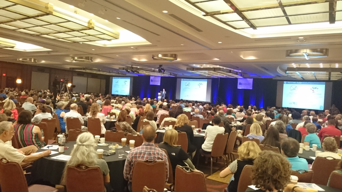The 2016 convention was the second biggest on record, with nearly a thousand delegates, shown here listening to CHDI Foundation's Robert Pacifici  
