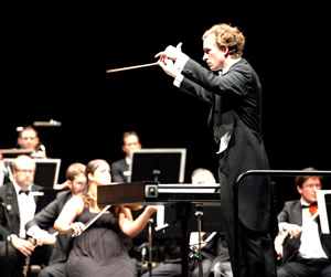 HD can cause the striatum to become like an orchestra without a conductor. Deep brain stimulation aims to calm down the chaotic activity of the striatum using electrical pulses.