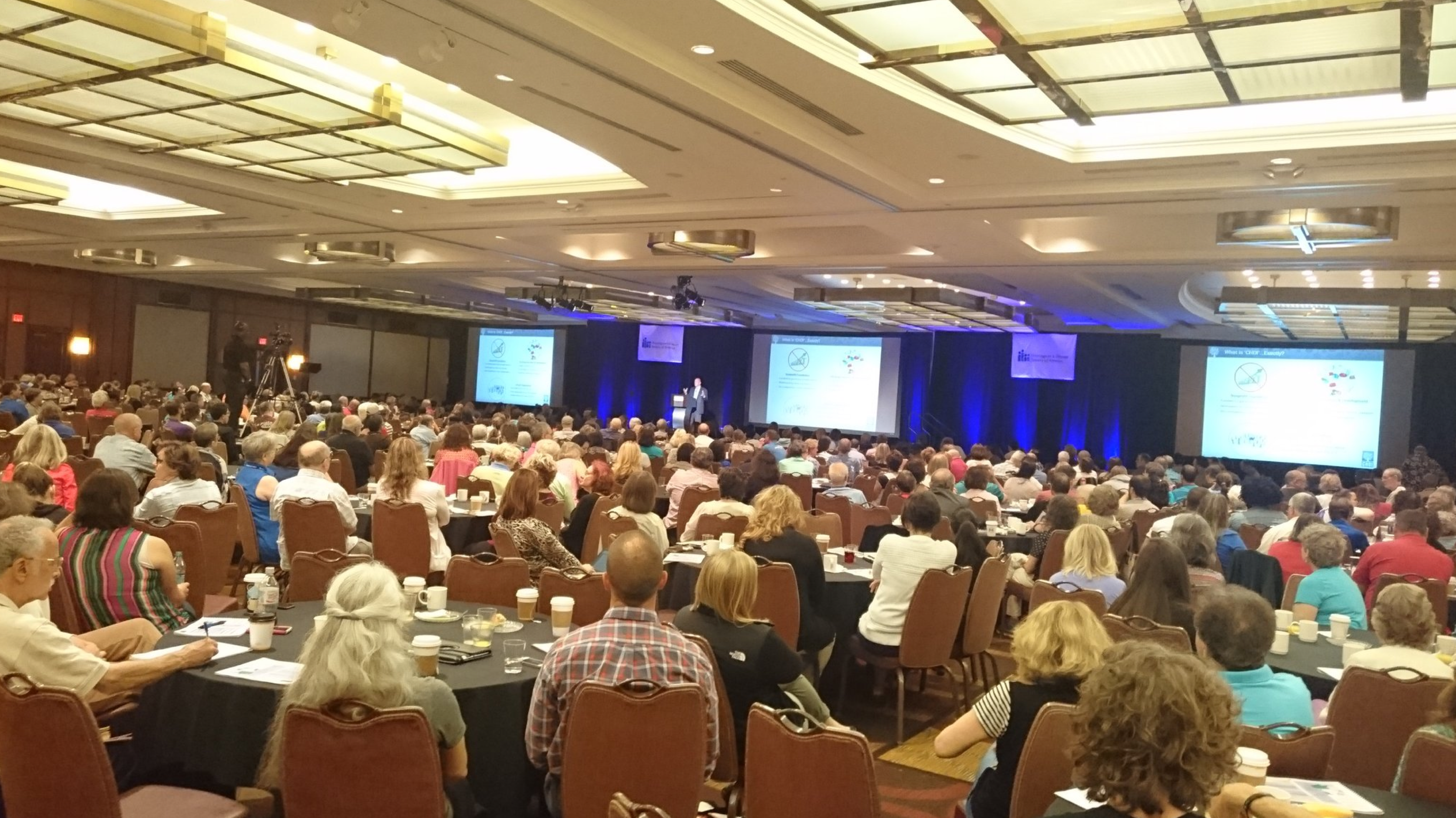 The 2016 convention was the second biggest on record, with nearly a thousand delegates, shown here listening to CHDI Foundation's Robert Pacifici