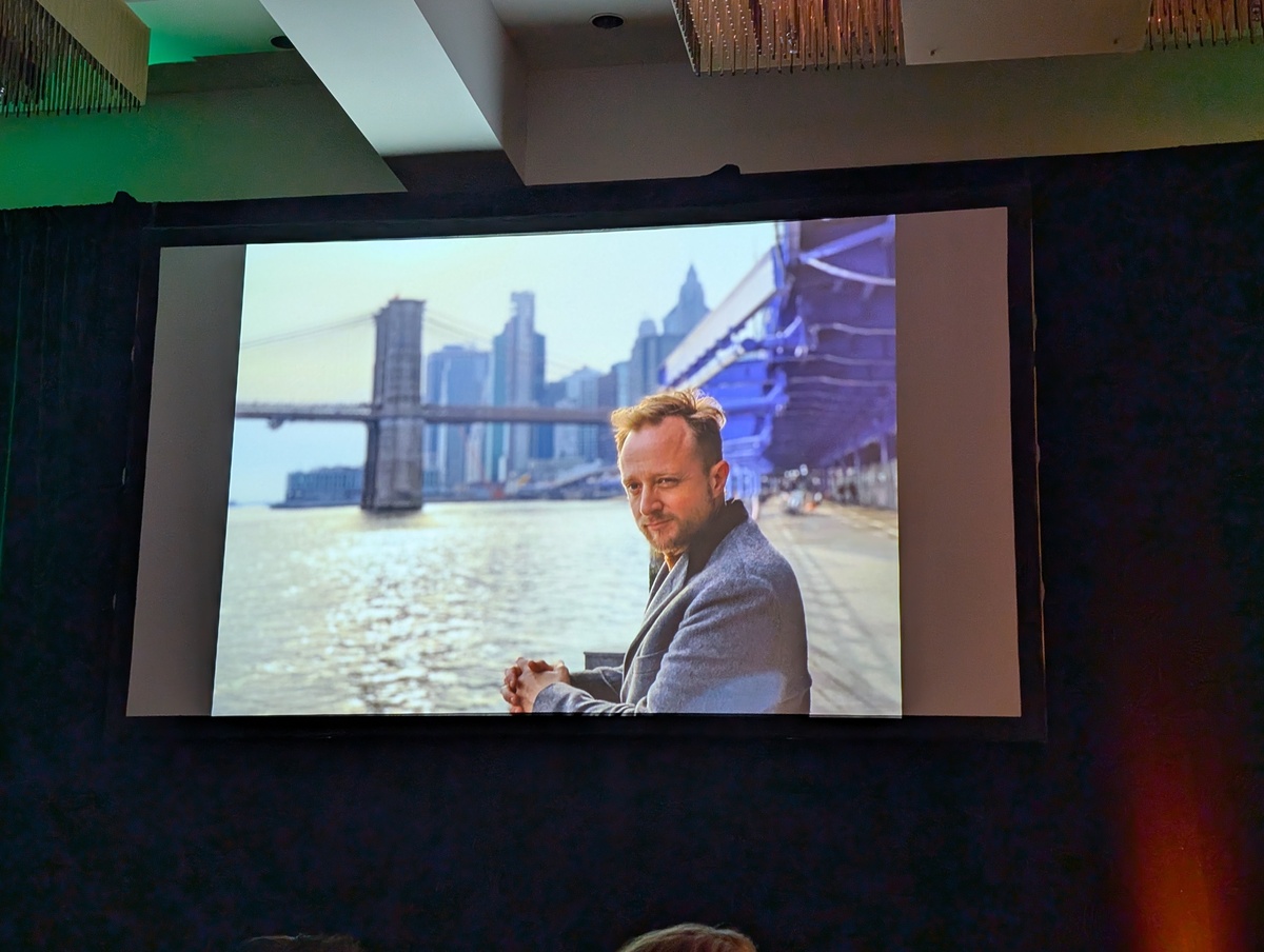 There in spirit, a pensive image of HDBuzz Editor Emeritus, Dr. Ed Wild was flashed on the screen. It's seemingly impossible to have a Huntington's disease event without Ed present!  